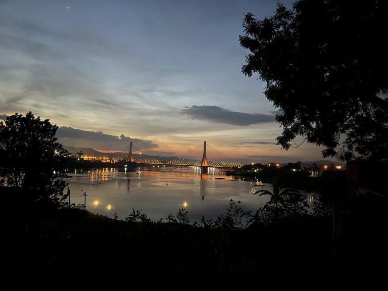 The River Nile at dusk from Hotel Paradise, with the Source of the Nile Bridge lit up